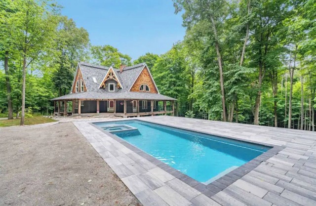 Luxury Chalet in the Woods w/ Pool & Hot Tub, Near Wasaga Beach & Blue Mountain!