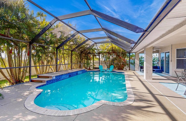 Luxury coastal retreat with office, lanai, pool, alfresco dining & tiki bar