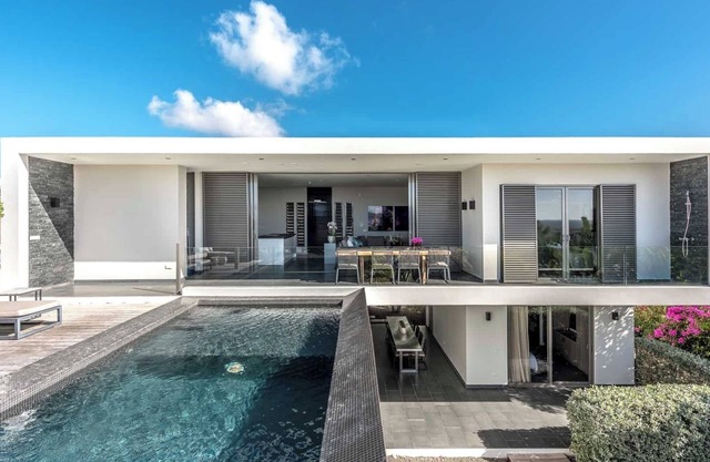 Luxury designer villas with private pool, shared gameroom and gym!