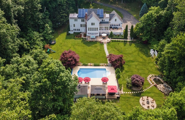 Luxury House with Indoor Pool, Koi Pond and Outdoor Oasis