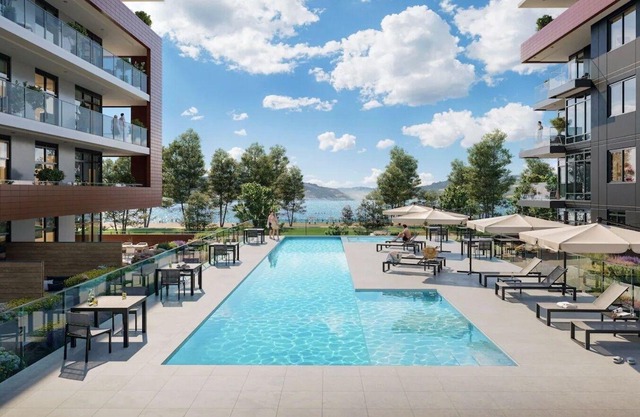 Luxury Lakeside Escape – Brand New 2 bed/2 bath Furnished Condo, patio to pool!