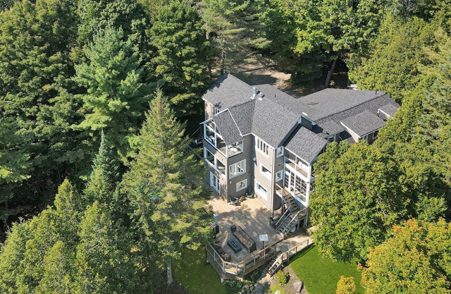 Luxurious lakefront property complete with a hanging bed!