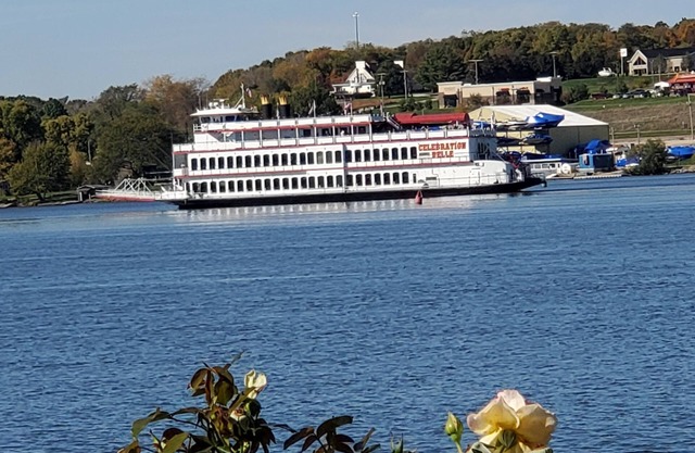 Luxury river front two-bedroom carriage house with private deck and hot tub.