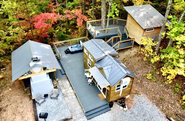 Luxury Tiny House with Treehouse Bedroom and HotTub on 34acres secluded