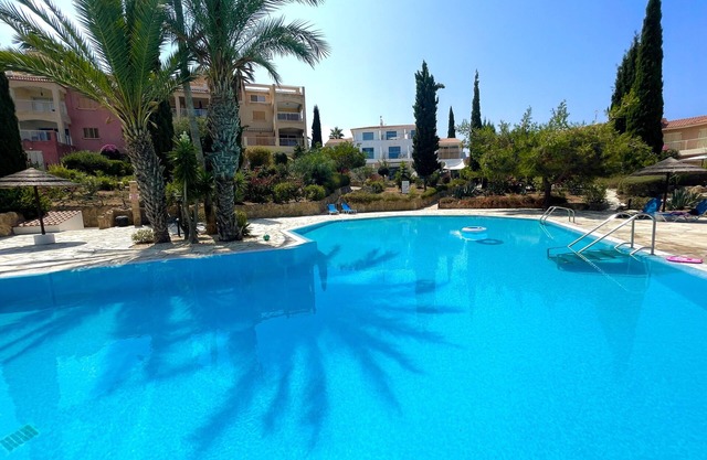Luxury villa on Regina Gardens 1 with terrace overlooking the pools and gardens