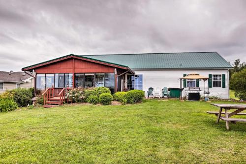 Lyndonville Home with Fire Pit, Screened Patio and AandC