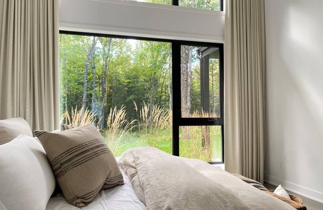Magnificent home nestled in forest with lake access
