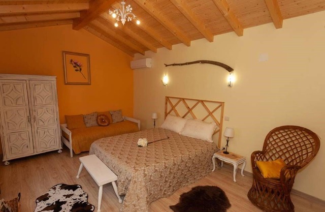 Magnolias Cottage - Suite mit Terrasse und Gartenblick
