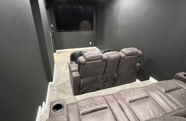 Main Street Location 4 bedrooms, 2 Baths, Theater Room and Spacious Living Room.