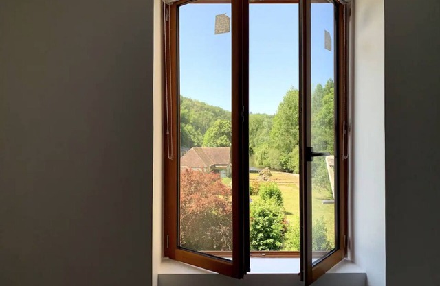 Maison au Bord de la Rivière