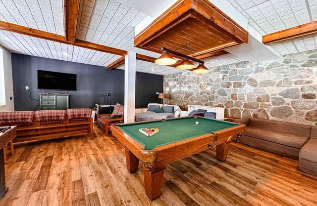 Maison du lac avec plage, embarcations, billard et spa privé