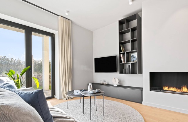 Marina Suite - Ethanol-Kamin, Waschtrockner, Infrarotkabine, Quooker, Terrasse