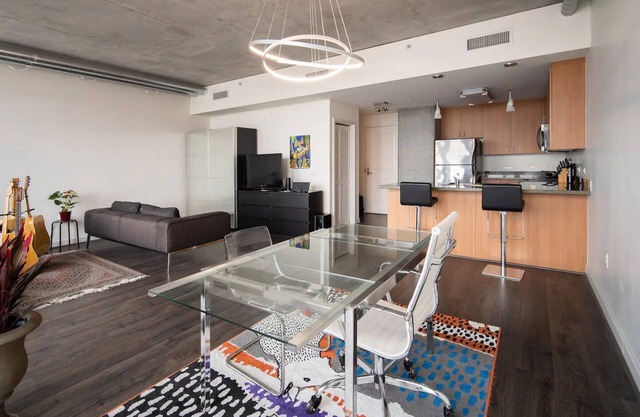 Massive Studio with Incredible Mountain Views, 16 Floors Above the City Skyline