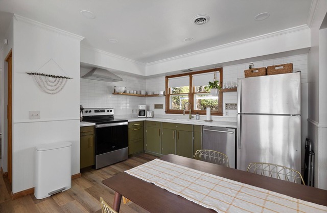 Brand New Listing! Midcentury Modern Meets Boho 3 Bedroom/1 Bath