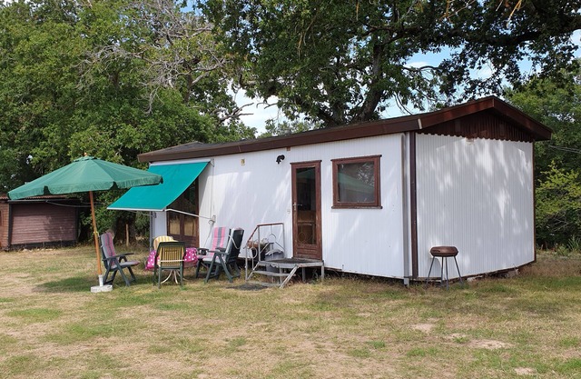 Mobile Home, for 2 adults and 3 children, surrounded by meadows with animals