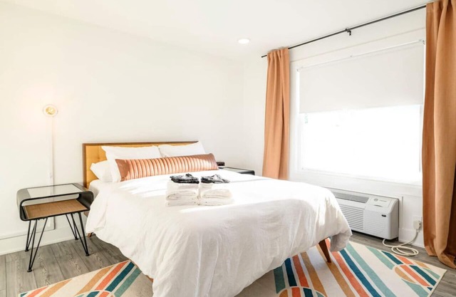 Modern 1-Bed Condo | OPEN POOL with City Access
