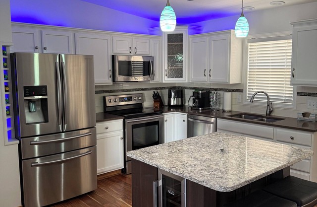 Roomy, modern 3-bedroom, 3 full bath, 2 living areas, game lounge and hot tub!