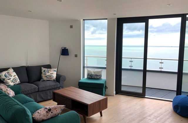 Modern apartment on sea front, direct access to beach, harbour, restaurants
