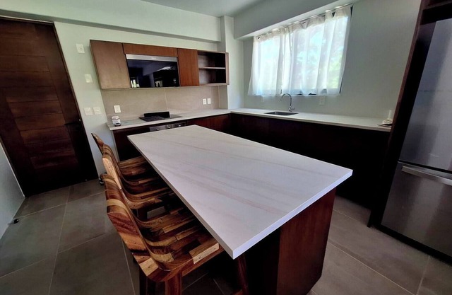 Modern Apt with Pool - 5 Min walk to Chahue Beach