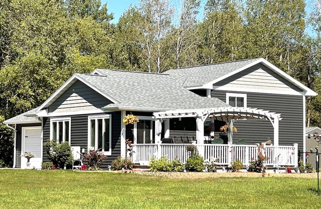 Modern Attached garage Dog friendly ATV & Sled friendly