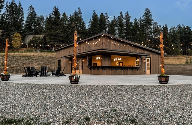 Modern cabin on 10 creek front acres with large gas fire pit.