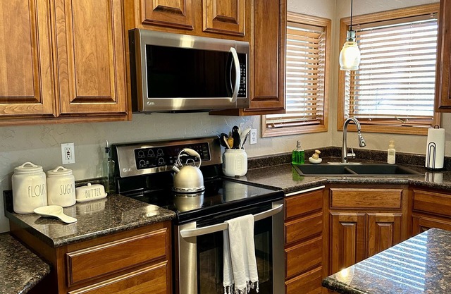 Modern comforts in this spacious home - Stay, work, play!