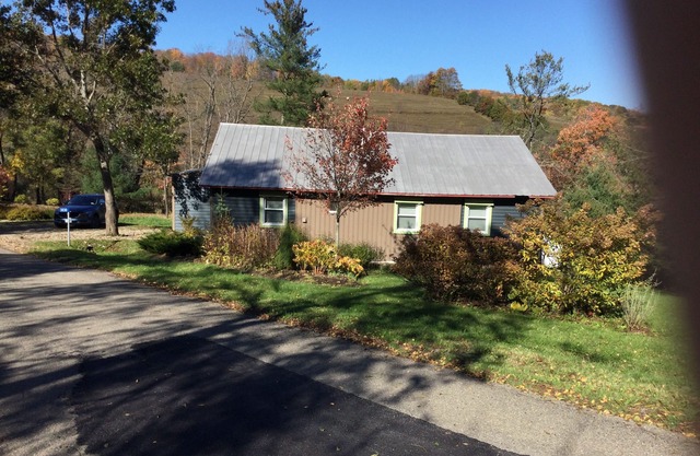 Modern cottage located in 250 private acres Pond Fishing Hiking Fire Pit