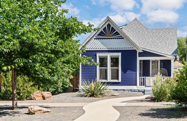 Modern downtown Victorian with open living/kitchen.