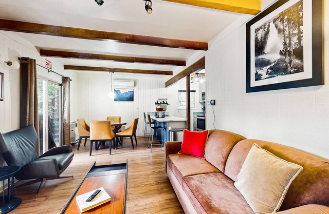 Modern duplex cabin with fireplace, balcony, & EV charger plus mountain views