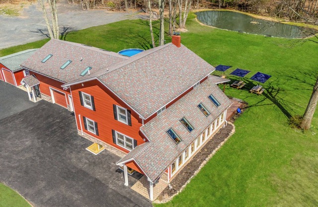 Modern Farmhouse w/ heated pool, hot tub, fishing pond, movie theater, game room