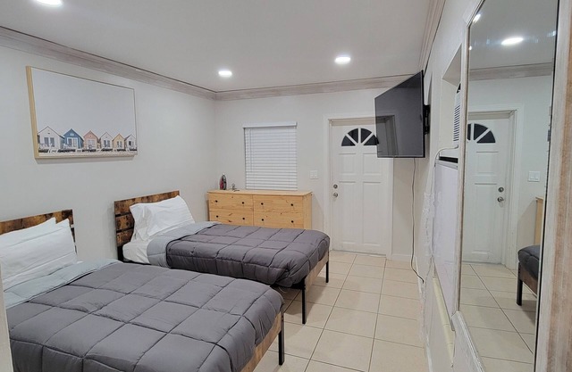 Modern guest suite with adorable outdoor lounge!