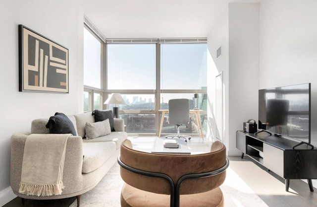 Modern Hoboken 2BR w/ Doorman, Gym & W/D, near shuttle, by Blueground