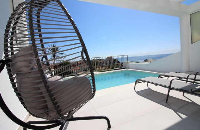 Modern house, private heated pool and sea views