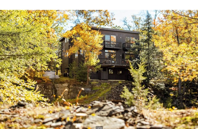 Modern interiors with beautiful view of mountains and a private bluestone quarry