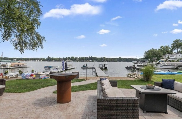 Modern Lake-Front Cottage on Bostwick Lake; Large Patio, Sandy Beach