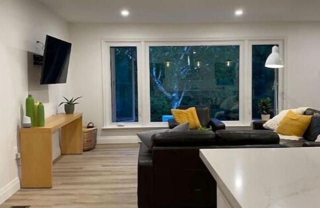 Modern meets nature. Short stroll to lake and downtown. Newly renovated.