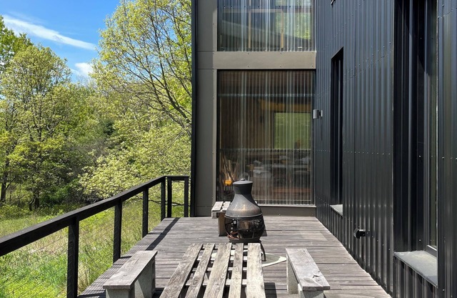 Modern Mountain House in small walkable hamlet with a view surrounded by nature.
