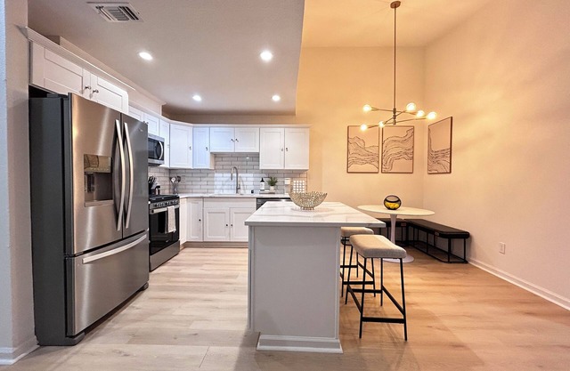 Modern newly renovated 3-bedroom duplex in welcoming Sacramento with Wi-Fi, AC