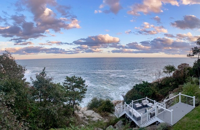 Modern oceanfront home with scenic deck, grill, games, chef's kitchen, & W/D