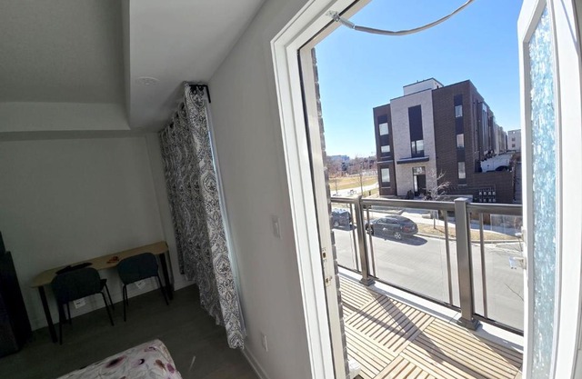 Modern Private Room Private Bathroom with King Bed with TV and Optional Balcony 10 minutes to Rogers Stadium Midtown Downtown Toronto