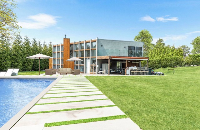 Modern, resort-style retreat in the heart of Shinnecock Hills, luxurious...