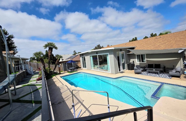 Modern Retreat with Pool, Game Room,Playhouse, Fenced Yard.