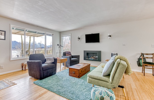 Modern, river-view home with 2 decks, Ping-Pong, fireplace & washer/dryer