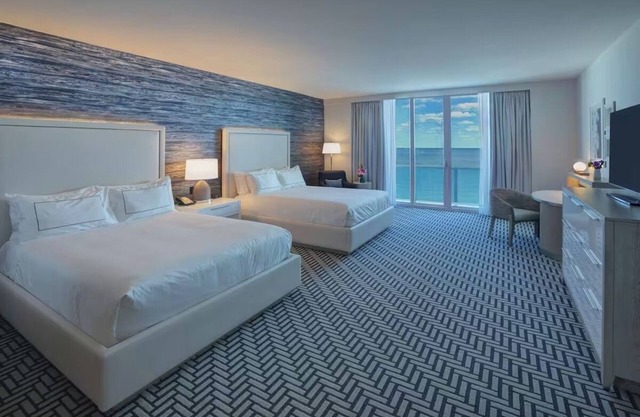 Modern Room with Balcony and Breathtaking Ocean Views Near Top Restaurants