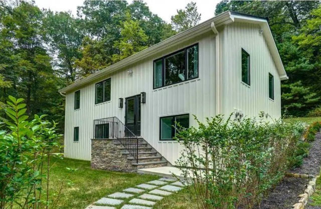 Modern & secluded with a private outdoor hot tub and sauna!