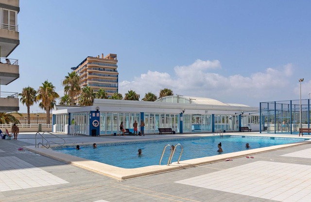 Modern vacation apartment with panoramic view and fitness room.