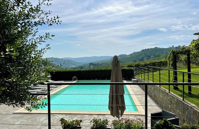 Modern villa with private pool and panoramic vineyard views in Piemonte.