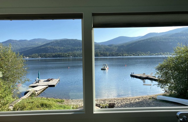 Modern Vintage Lake Front Cabin. Huge Private Beach and Dock.
