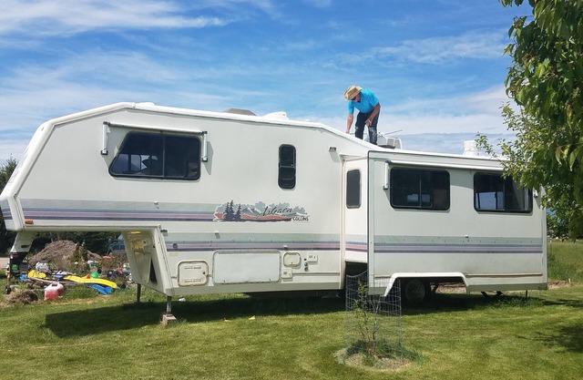 Montana Mountain Memories- RV in Orchard by Trout Pond