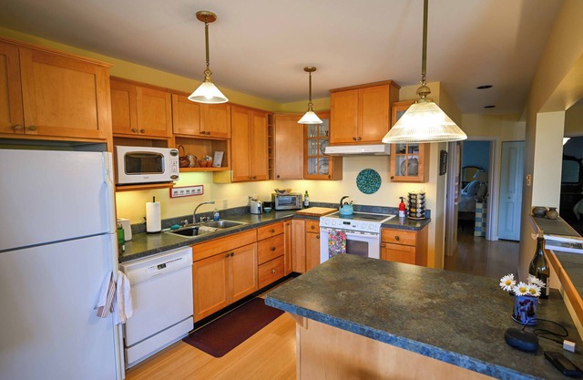 Monthly Rental Only - Charming two-bedroom furnished garden apartment